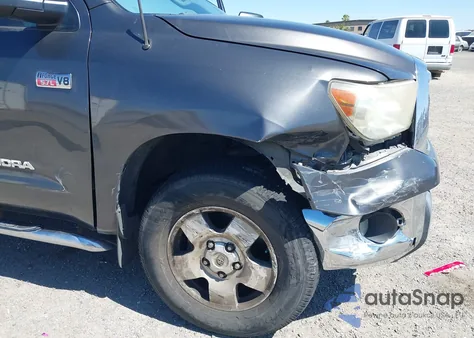 2011 Toyota Tundra Grade 5.7L V8 z USA, uszkodzony, nr VIN 5TFEY5F13BX103130